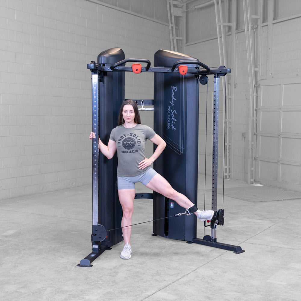 Woman doing lateral leg raises on a Body-Solid Pro ClubLine S2CCX Series II Cable Column in black