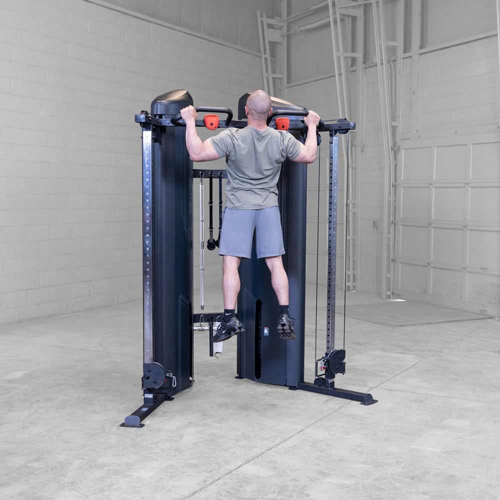 Wide grip pull ups on a Body-Solid Pro ClubLine S2CCX Series II Cable Column in black