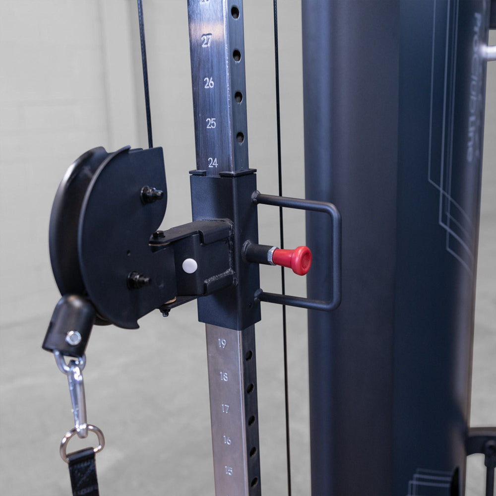 Gym equipment with pulley system with red adjustable notch on a Body-Solid Pro ClubLine S2CCX Series II Cable Column in black