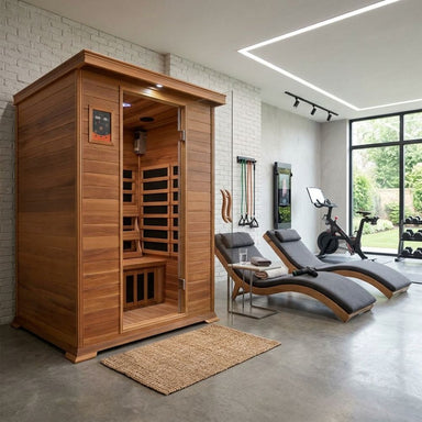 SunRay 2-Person Sierra Sauna HL200K in a modern room with lounge chairs and fitness equipment.