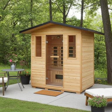 Wooden Sunray outdoor sauna HL400D3 in a garden setting with trees and a patio table.