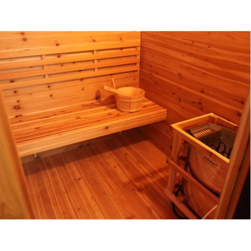 SunRay Denali 4 Person Contemporary Outdoor Sauna  with Harvia 6kW Heater and Metal Roof 400D5 with a bench, basket, and heater.