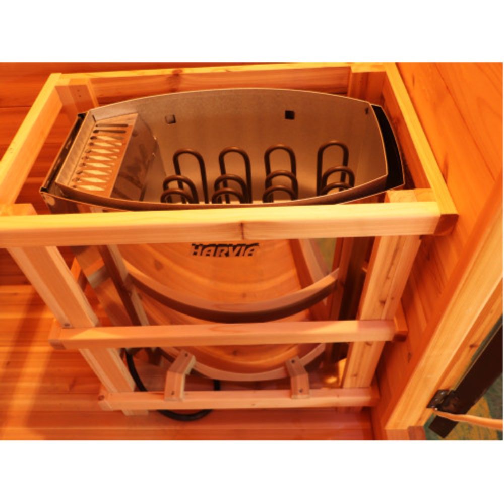 SunRay Seneca 3-Person Contemporary Outdoor Traditional Sauna with a metal grill inside, featuring the brand 'Hansa'.