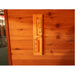 SunRay Seneca 3-Person Contemporary Outdoor Traditional Sauna Wooden door with a temperature gauge and ruler on a wooden surface