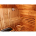 SunRay-Aurora 2-4 person Barrel Sauna  with a bucket and thermometer on the wall.