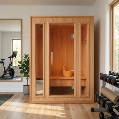 Sunray 3-Person Southport Traditional Steam Sauna HL300SN in a room with exercise equipment and a plant