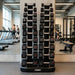 TKO 10 Pair Vertical Dumbbell Rack 840VDR10-BK in a gym with a mirror and TKO Tri-Grip Hex Dumbbell 5-50 lb Set, 816TXU