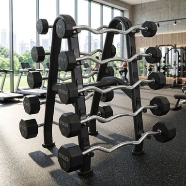 barbell and barbell rack in a gym setting with large windows.