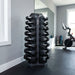 Stack of TKO dumbbells on a rack in a home gym setting