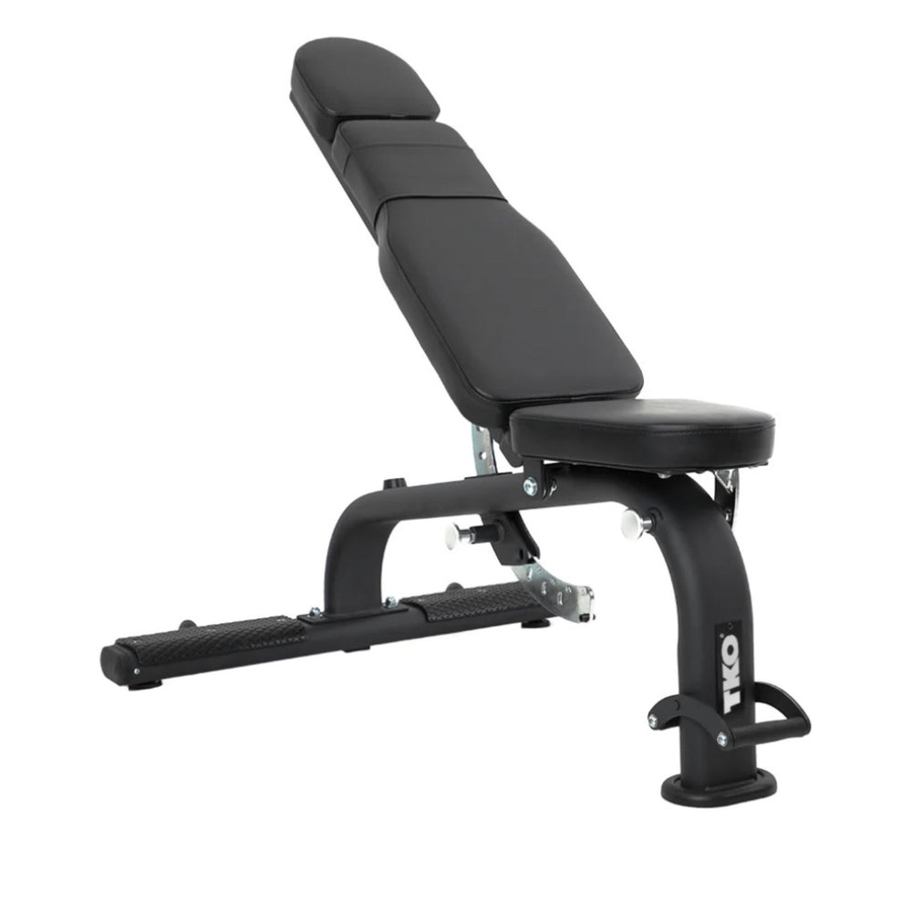 An adjustable flat or incline TKO Commercial FID Dumbbell Bench, black in color, designed for various workouts with incline and decline adjustment settings.