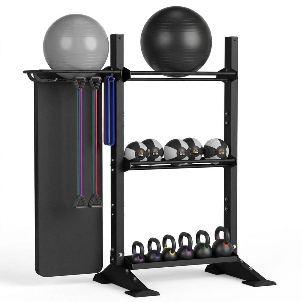 TORQUE Black metal wall base fitness storage rack with exercise balls, resistance bands, and kettlebells on a white background