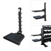 Black weightlifting rack with attachments on a white background