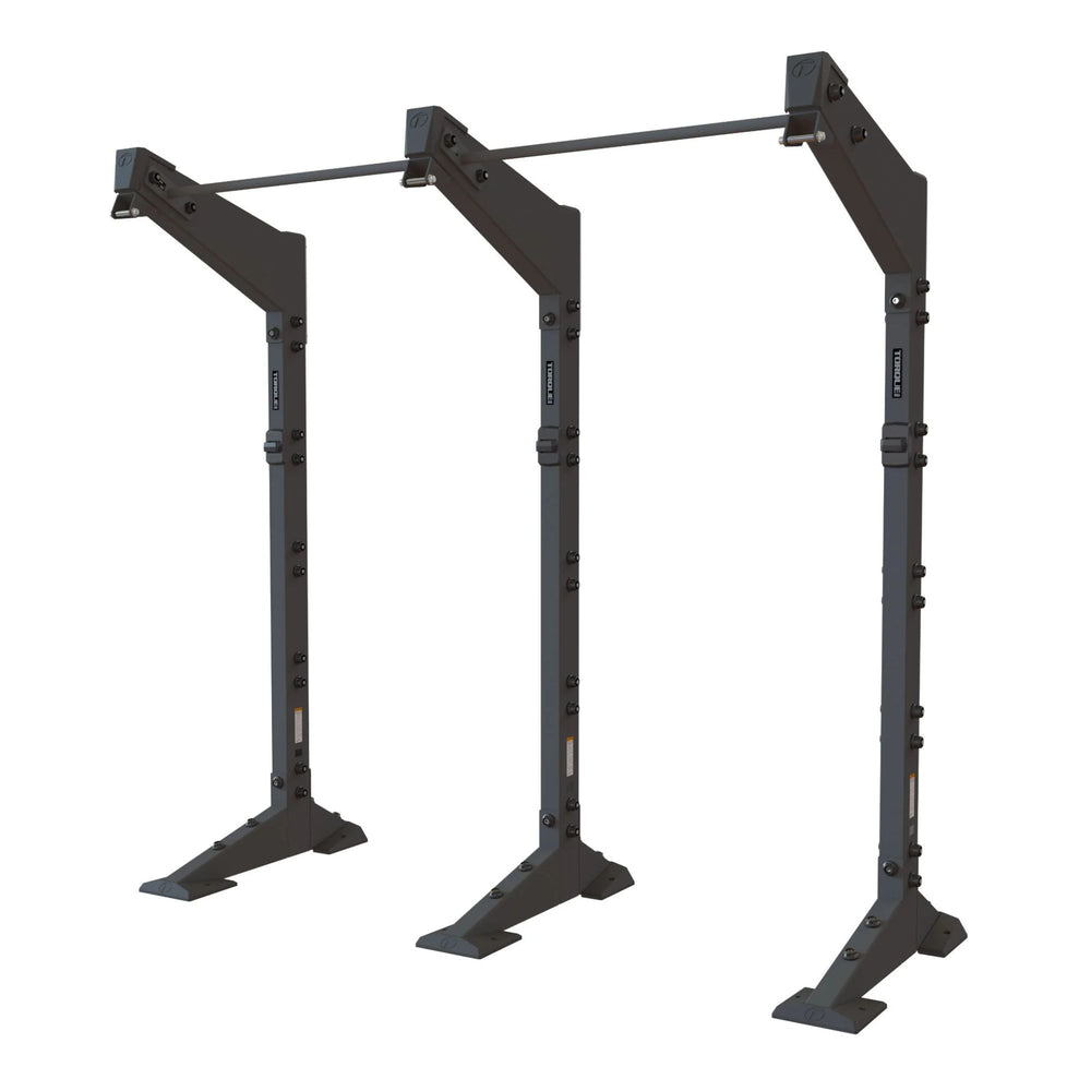 Torque Black metal pull-up bar and squat rack on a white background
