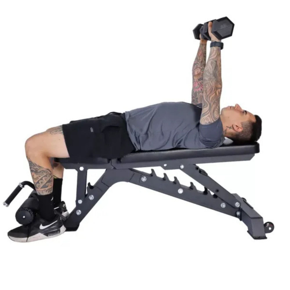 Vortex Commercial Adjustable Flat, Incline, Decline Bench with leg holders VXFIDL250 Man performing dumbbell bench press