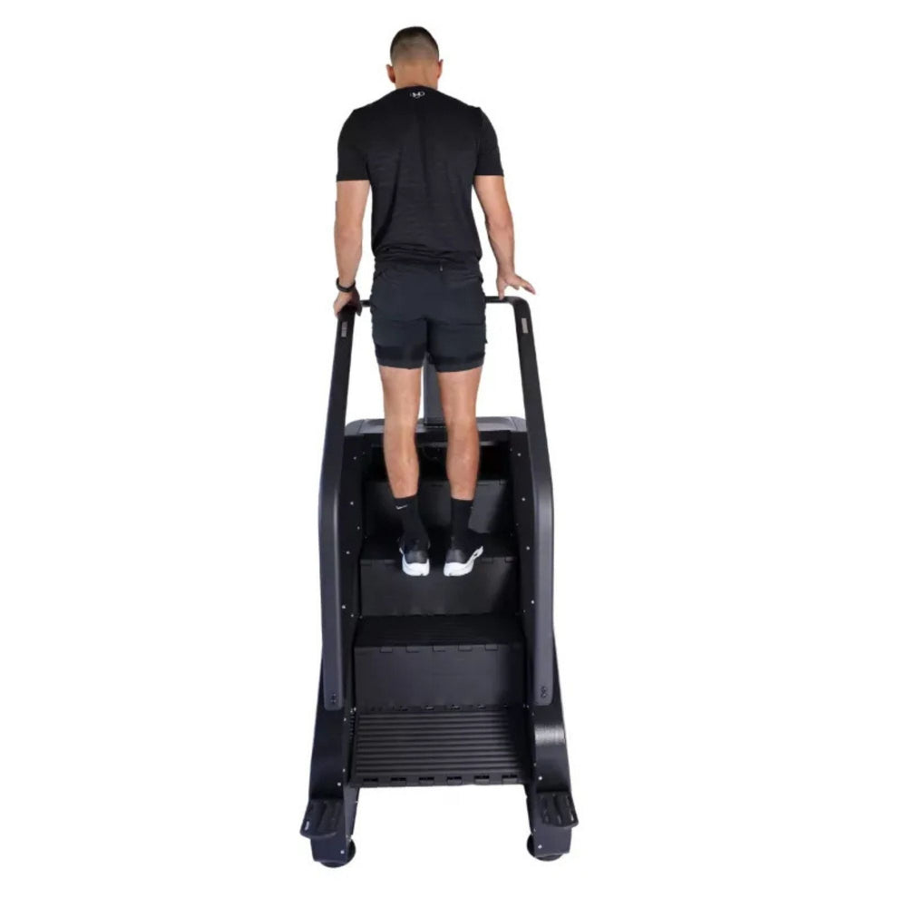 Vortex Commercial Stair Stepper with integrated TV ST4000 Rear view of person on Vortex Stair Stepper