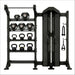 Torque storage bay with weighted medicine balls on a 5 tier shelf with 6 kettle bells on the lower shelves. the storage bay also has a single cable column on the right side on a white background