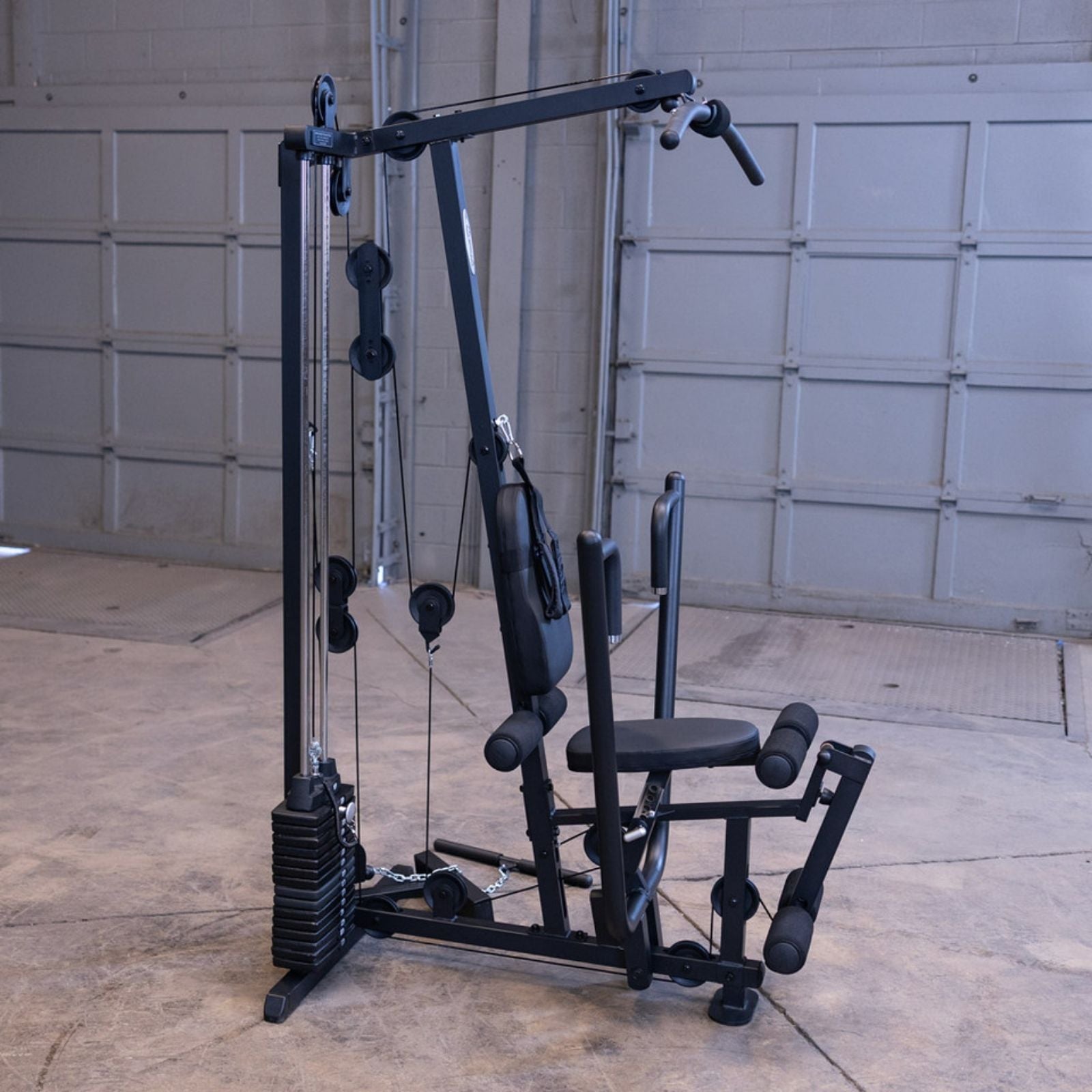 Body-Solid G1S Multi-Station Gym shown in a home gym setup with all workout stations and attachments visible