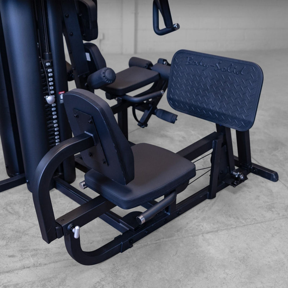 Close-up of Body-Solid G9B dual stack home gym leg press seat, backrest, and frame construction
