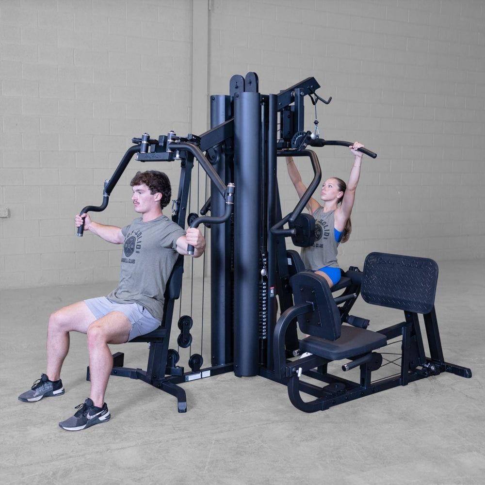 Body-Solid G9B multi-stack home gym featuring pec deck chest fly and lat pulldown stations for simultaneous training
