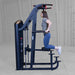 S2ACDX Series 2 Weight Assist Vertical Knee Raise Woman exercising on a black cable machine in a gray studio setting