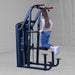  S2ACDX Series 2 Weight Assist Vertical Knee Raise Woman using a gym machine in a gray indoor setting