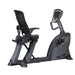 SportsArt C521M rehabilitation recumbent bike with reclining mesh seat, adjustable crank system, and medical-grade console.