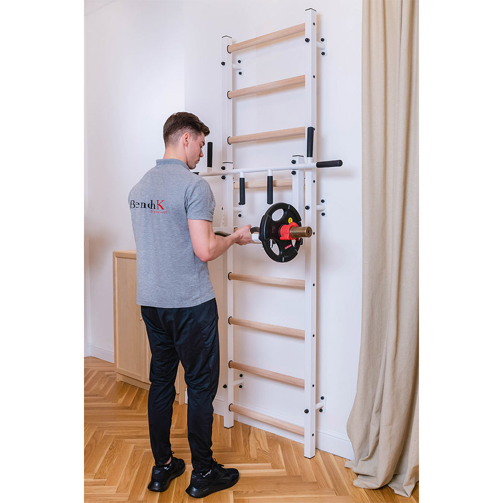 BenchK Wall Bar 711W wit user exercising with standing barbell curls