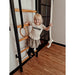 BenchK Wall Bar with Pull-Up Bar 221B + A076 with child on the wall bar rungs