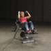 Body-Solid Semi-Recumbent Ab Bench Fitness Model exercisiing crunches