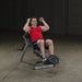 Body-Solid Semi-Recumbent Ab Bench  fitness model exercises crunches and knee raises