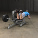 The Body-Solid ProClubLine Leverage Leg Curl Machine (LVLC) back view  hamstring curl
