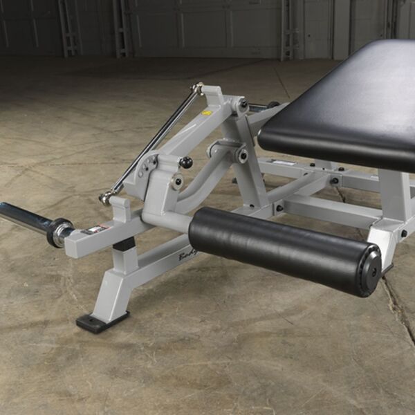 The Body-Solid ProClubLine Leverage Leg Curl Machine (LVLC) Foot Rollers
