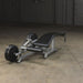 The Body-Solid ProClubLine Leverage Leg Curl Machine (LVLC) Machine Backview with weight plates added