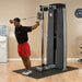 Body-Solid Pro Dual Adjustable Cable Column Machine DPCC-SF model exercising a chest fly