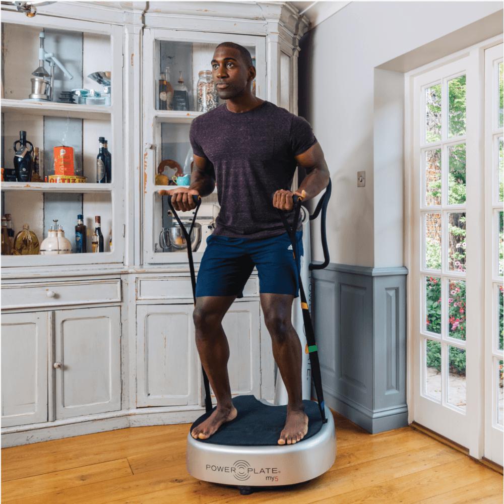Power Plate My5 Vibration Trainer compound bicep and thigh exercise
