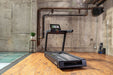 SportsArt Elite Senza Treadmill-16-inch - T674-16 back facing view inside gym setting