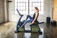 SportsArt Status Eco-Powr Recumbent Cycle G576R user exercising inside home gym 