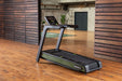 SportsArts Elite Eco-Powr Treadmill G660 inside a gym setting side back view