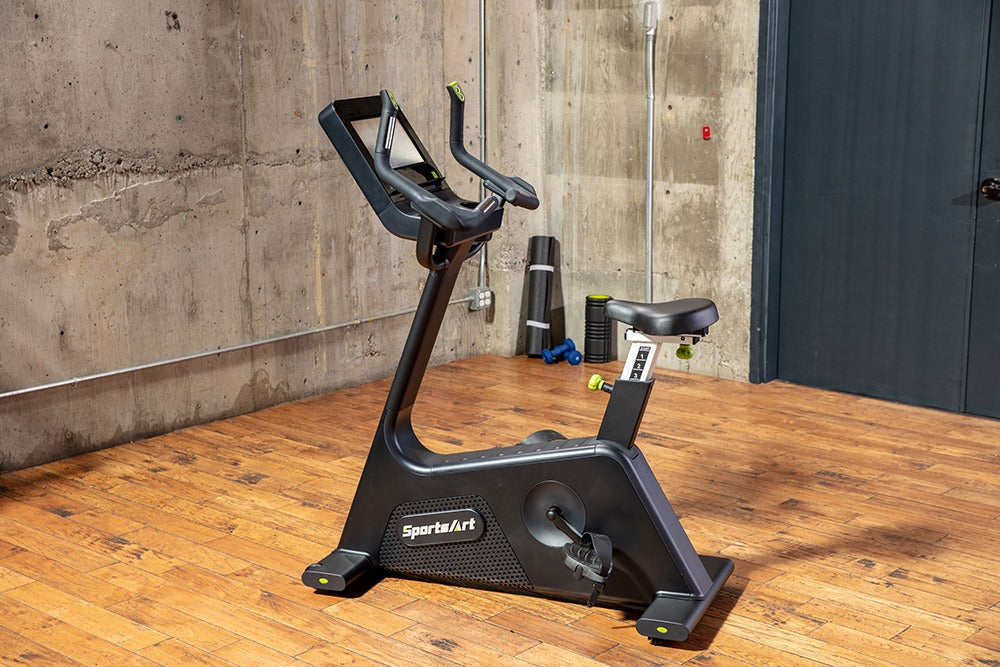 SportsArts Elite Senza Upright Cycle-13 inch C574U-13 side view angle inside home gym 