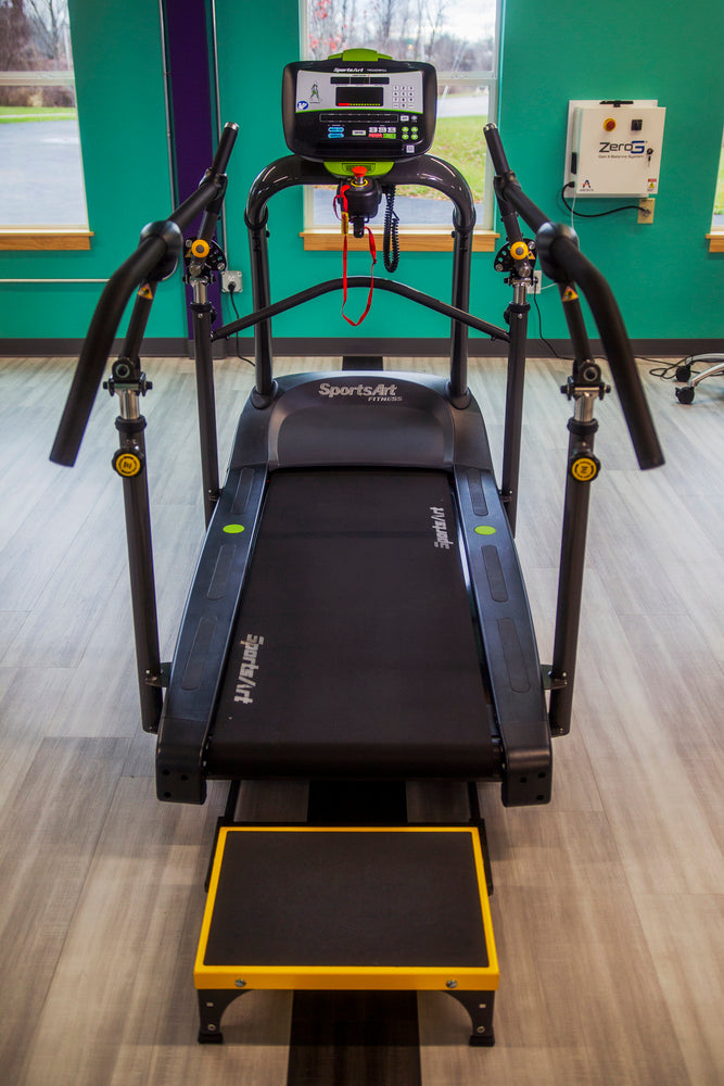 SportsArts Medical Treadmill T655MD back view inside a physical therapy studio 