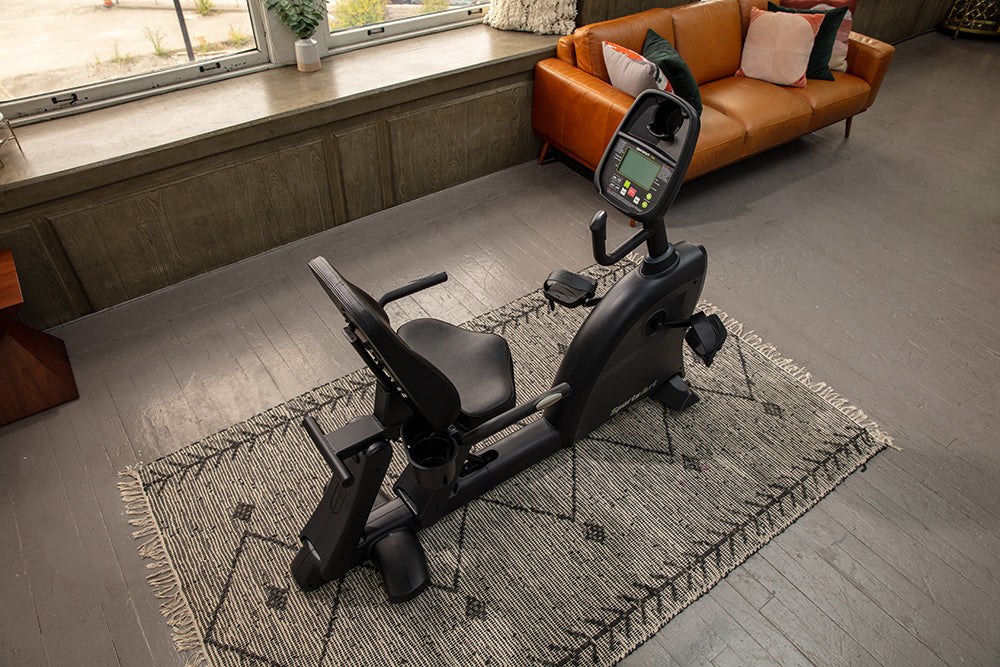 SportsArts Residential Recumbent Bike C55R aerial view inside a home setting 